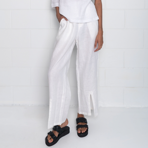 White linen pants with split detail at the front 